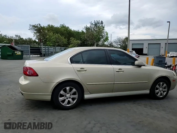 2008 Kia Optima LX z VIN KNAGE124385198719, wystawiony jako Copart lot #55449255 z przebiegiem 156 972 mil mil oraz Szkoda całkowita • Salvage title. Historia ofert i sprzedaży dostępna na DreamBid. Obrazek 13.