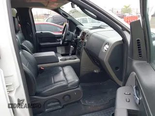 2005 Ford F-150 XLT with VIN 1FTPW14595FA87670, listed as a IAAI auction lot 42157009 with 291,713 mi miles. Bid and sale history available at carsss.com. Image 5.