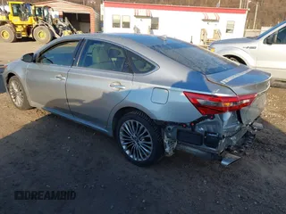 2016 Toyota Avalon Limited with VIN 4T1BK1EB6GU221488, listed as a IAAI auction lot 41753245 with 97,736 mi miles and . Bid and sale history available at DreamBid. Image 3.