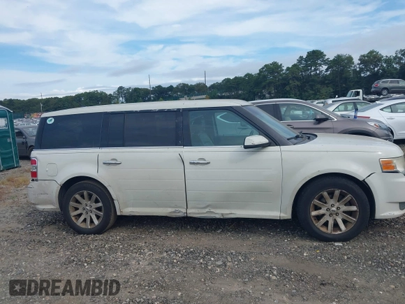 2011 Ford Flex SEL z VIN 2FMGK5CC4BBD17708, wystawiony jako IAAI lot #40367967 z przebiegiem 223 799 mil mil oraz . Historia ofert i sprzedaży dostępna na DreamBid. Obrazek 13.