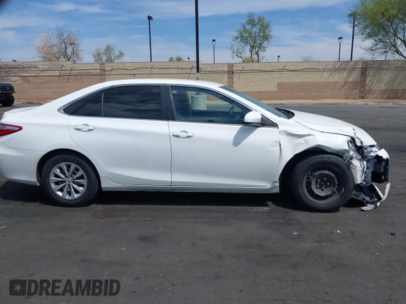 2015 Toyota Camry XLE with VIN 4T1BF1FK3FU114299, listed as a IAAI auction lot 42024946 with 152,972 mi miles. Bid and sale history available at carsss.com. Image 13.