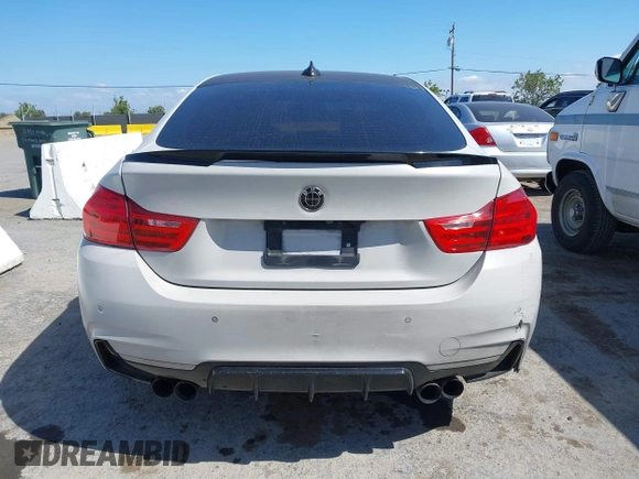 2015 BMW 4 Series 428i xDrive with VIN WBA4C9C54FD330582, listed as a IAAI auction lot 42135691 with 127,289 mi miles and . Bid and sale history available at DreamBid. Image 15.
