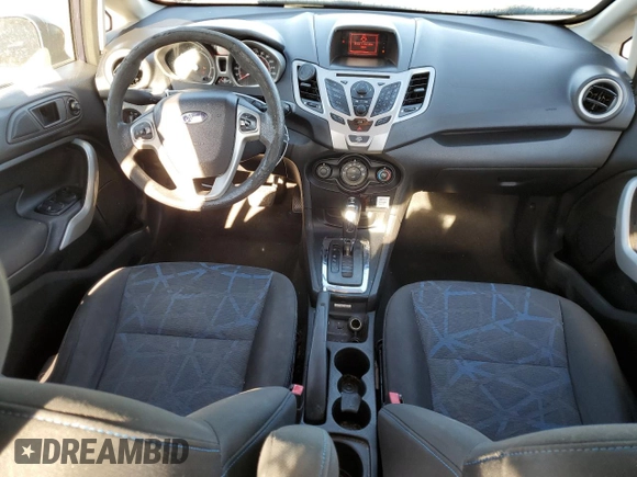 2013 Ford Fiesta SE z VIN 3FADP4BJ9DM186382, wystawiony jako Copart lot #67754934 z przebiegiem 157 495 mil mil oraz Szkoda całkowita • Salvage title. Historia ofert i sprzedaży dostępna na DreamBid. Obrazek 8.
