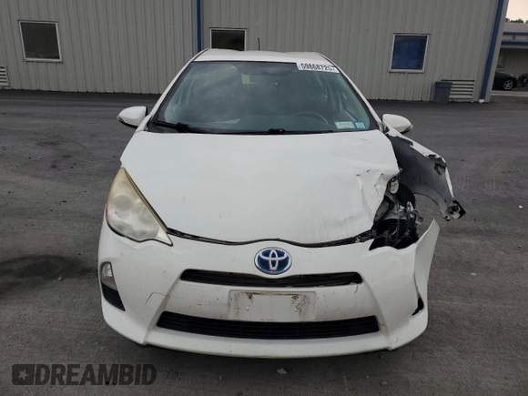 2012 Toyota Prius One z VIN JTDKDTB3XC1509615, wystawiony jako Copart lot #59868725 z przebiegiem Nie podano mil oraz Szkoda całkowita • Salvage title. Historia ofert i sprzedaży dostępna na DreamBid. Obrazek 5.