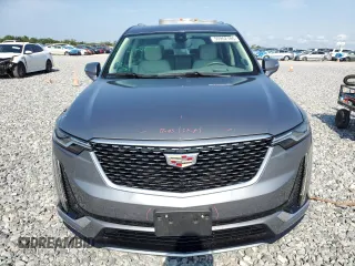 2021 Cadillac XT6 Premium Luxury z VIN 1GYKPCRS5MZ197527, wystawiony jako Copart lot #55952185 z przebiegiem 24 856 mil mil oraz Szkody całkowita. Historia ofert i sprzedaży dostępna na DreamBid. Obrazek 5.