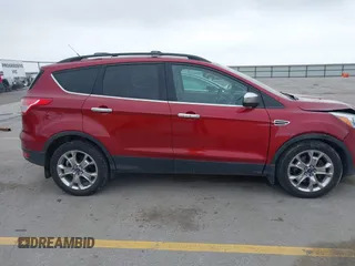 2014 Ford Escape SE with VIN 1FMCU9G90EUD89356, listed as a IAAI auction lot 41841229 with 148,997 mi miles and . Bid and sale history available at carsss.com. Image 13.