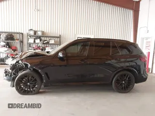 2023 BMW X5 xDrive40i with VIN 5UXCR6C07P9P99054, listed as a IAAI auction lot 42077507 with 18,605 mi miles and . Bid and sale history available at DreamBid. Image 15.