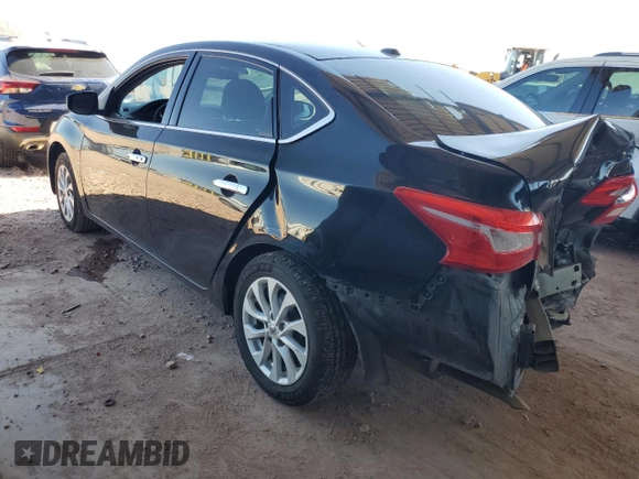 2018 Nissan Sentra SV with VIN 3N1AB7AP4JL657779, listed as a Copart auction lot 56602985 with 104,462 mi miles and Salvage title. Bid and sale history available at DreamBid. Image 2.