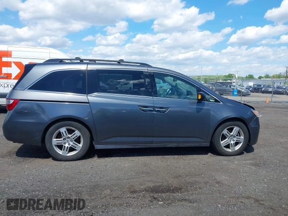 2011 Honda Odyssey Touring Elite with VIN 5FNRL5H96BB043339, listed as a IAAI auction lot 42174767 with 161,233 mi miles and . Bid and sale history available at DreamBid. Image 13.