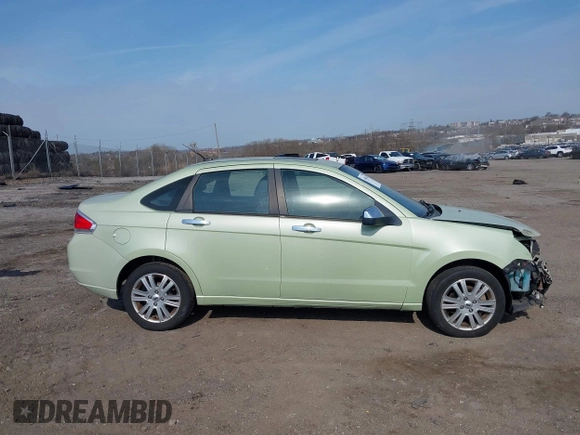 2011 Ford Focus SEL with VIN 1FAHP3HN9BW158004, listed as a IAAI auction lot 41908424 with 139,762 mi miles. Bid and sale history available at carsss.com. Image 14.