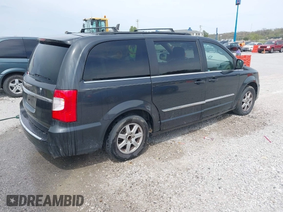 2012 Chrysler Town & Country Touring z VIN 2C4RC1BG8CR189120, wystawiony jako IAAI lot #42014671 z przebiegiem 204 734 mil mil oraz . Historia ofert i sprzedaży dostępna na DreamBid. Obrazek 4.