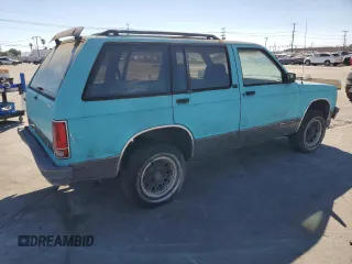 1991 GMC Jimmy z VIN 1GKCS13Z2M2518231, wystawiony jako Copart lot #64115274 z przebiegiem 132 698 mil mil oraz Czysty tytuł • Clean title. Historia ofert i sprzedaży dostępna na DreamBid. Obrazek 3.