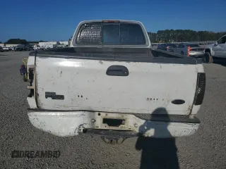 1998 Ford F-150 with VIN 1FTZF18W3WNB98041, listed as a Copart auction lot 77530824 with 194,712 mi miles and Salvage title. Bid and sale history available at DreamBid. Image 6.