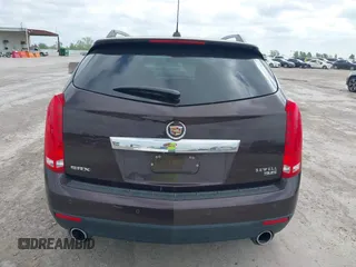 2015 Cadillac SRX Luxury Collection z VIN 3GYFNBE35FS597538, wystawiony jako IAAI lot #42056002 z przebiegiem 49 483 mil mil oraz . Historia ofert i sprzedaży dostępna na DreamBid. Obrazek 16.