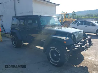 2013 Jeep Wrangler Unlimited Sport z VIN 1C4HJWDG9DL510121, wystawiony jako IAAI lot #42389944 z przebiegiem 84 390 mil mil oraz . Historia ofert i sprzedaży dostępna na DreamBid. Obrazek 1.