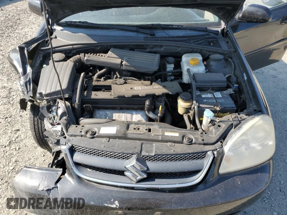 2008 Suzuki Forenza z VIN KL5JD56ZX8K974392, wystawiony jako Copart lot #64694854 z przebiegiem 145 180 mil mil oraz Szkoda całkowita • Salvage title. Historia ofert i sprzedaży dostępna na DreamBid. Obrazek 12.
