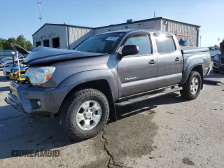 2015 Toyota Tacoma with VIN 5TFLU4EN6FX111679, listed as a Copart auction lot 61433105 with 136,777 mi miles and Salvage title. Bid and sale history available at DreamBid. Image 1.