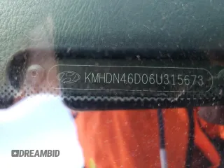 2006 Hyundai Elantra GLS z VIN KMHDN46D06U315673, wystawiony jako Copart lot #46815255 z przebiegiem 152 398 mil mil oraz Szkoda całkowita • Salvage title. Historia ofert i sprzedaży dostępna na DreamBid. Obrazek 12.