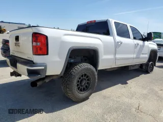 2015 GMC Sierra 2500HD available WiFi Denali with VIN 1GT120E80FF659215, listed as a Copart auction lot 48356455 with 134,796 mi miles and Salvage Title. Bid and sale history available at carsss.com. Image 3.