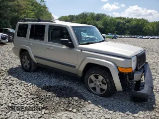 2007 Jeep Commander Sport z VIN 1J8HG48K67C651209, wystawiony jako Copart lot #64049035 z przebiegiem 216 628 mil mil oraz Szkoda całkowita • Salvage title. Historia ofert i sprzedaży dostępna na DreamBid. Obrazek 4.