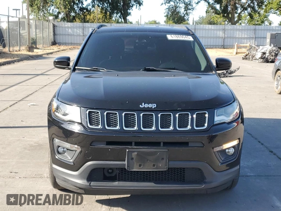 2018 Jeep Compass Latitude with VIN 3C4NJCBB6JT285892, listed as a Copart auction lot 61869045 with 63,315 mi miles and Salvage title. Bid and sale history available at DreamBid. Image 5.