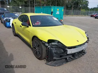 2021 Porsche Taycan z VIN WP0AA2Y1XMSA18769, wystawiony jako IAAI lot #42506990 z przebiegiem 32 264 mil mil oraz . Historia ofert i sprzedaży dostępna na DreamBid. Obrazek 1.