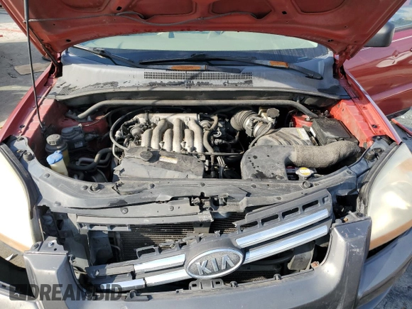 2005 Kia Sportage LX with VIN KNDJF723257122120, listed as a Copart auction lot 43386055 with 191,082 mi miles and Salvage Title. Bid and sale history available at carsss.com. Image 12.