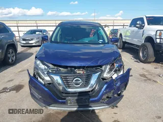 2017 Nissan Rogue SV with VIN JN8AT2MT1HW130104, listed as a IAAI auction lot 42194412 with 98,958 mi miles and . Bid and sale history available at DreamBid. Image 12.