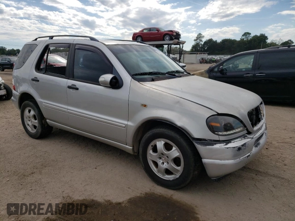 2002 Mercedes-Benz M-Class with VIN 4JGAB54E52A360097, listed as a Copart auction lot 72983104 with 199,445 mi miles and Salvage Title. Bid and sale history available at carsss.com. Image 4.