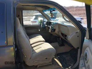 1997 Chevrolet Silverado 1500 with VIN 2GCEK19R5V1186749, listed as a IAAI auction lot 41738002 with 235,184 mi miles and . Bid and sale history available at DreamBid. Image 5.