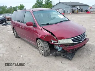 2004 Honda Odyssey EX-RES z VIN 5FNRL18884B086017, wystawiony jako IAAI lot #42377232 z przebiegiem 193 484 mil mil oraz . Historia ofert i sprzedaży dostępna na DreamBid. Obrazek 1.