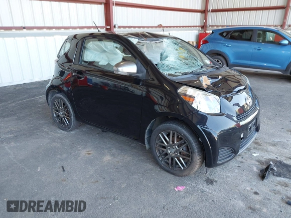 2012 Scion iQ with VIN JTNJJXB00CJ016247, listed as a IAAI auction lot 42117563 with 105,809 mi miles. Bid and sale history available at carsss.com. Image 1.