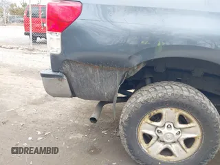 2010 Toyota Tundra with VIN 5TFUM5F16AX005232, listed as a IAAI auction lot 41688311 with 251,296 mi miles and . Bid and sale history available at DreamBid. Image 17.