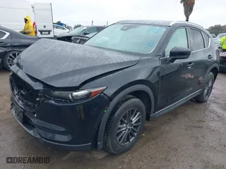 2021 Mazda CX-5 Touring with VIN JM3KFACM5M0314557, listed as a IAAI auction lot 41778401 with 31,938 mi miles. Bid and sale history available at carsss.com. Image 17.