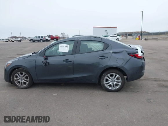 2018 Toyota Yaris with VIN 3MYDLBYV9JY321158, listed as a IAAI auction lot 41937684 with 85,020 mi miles and . Bid and sale history available at DreamBid. Image 14.