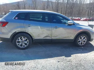 2015 Mazda CX-9 Sport with VIN JM3TB2BA7F0450544, listed as a IAAI auction lot 41812565 with 81,727 mi miles and . Bid and sale history available at carsss.com. Image 13.