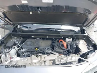 2023 Toyota RAV4 Hybrid SE with VIN JTM16RFV9PD113152, listed as a IAAI auction lot 42177056 with 41,204 mi miles and . Bid and sale history available at DreamBid. Image 10.