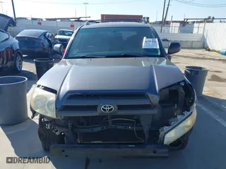 2003 Toyota 4Runner SR5 with VIN JTEZU14R238001341, listed as a IAAI auction lot 41670928 with 212,723 mi miles. Bid and sale history available at carsss.com. Image 13.