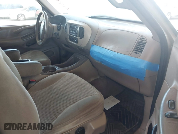 1999 Ford Expedition XLT with VIN 1FMRU17L1XLA49732, listed as a IAAI auction lot 42534373 with Not provided miles and . Bid and sale history available at DreamBid. Image 5.