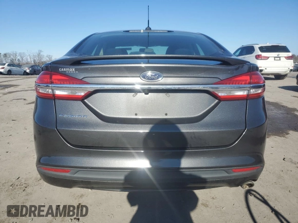 2017 Ford Fusion S with VIN 3FA6P0G76HR201606, listed as a Copart auction lot 41729265 with 124,475 mi miles and Salvage Title. Bid and sale history available at DreamBid. Image 6.