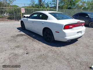 2013 Dodge Charger SE with VIN 2C3CDXBG9DH705485, listed as a IAAI auction lot 41788288 with 134,751 mi miles. Bid and sale history available at carsss.com. Image 3.