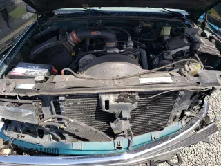 1998 Chevrolet Tahoe z VIN 1GNEK13R2WJ304666, wystawiony jako Copart lot #57833815 z przebiegiem 199 103 mil mil oraz Szkoda całkowita • Salvage title. Historia ofert i sprzedaży dostępna na DreamBid. Obrazek 12.