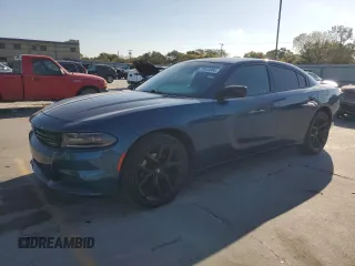 2020 Dodge Charger SXT with VIN 2C3CDXBG6LH190539, listed as a Copart auction lot 77913344 with 70,904 mi miles and Clean title. Bid and sale history available at DreamBid. Image 1.