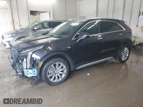 2023 Cadillac XT4 AWD Premium Luxury z VIN 1GYFZDR43PF174188, wystawiony jako Copart lot #59106355 z przebiegiem 27 530 mil mil oraz Szkoda całkowita • Salvage title. Historia ofert i sprzedaży dostępna na DreamBid. Obrazek 1.