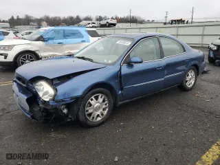 2004 Mercury Sable LS Premium with VIN 1MEFM55S34A615985, listed as a Copart auction lot 85428614 with 54,431 mi miles and Salvage Title. Bid and sale history available at carsss.com. Image 1.