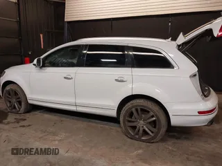 2013 Audi Q7 Premium Plus with VIN WA1LGAFE1DD009705, listed as a IAAI auction lot 41390712 with 99,649 mi miles and . Bid and sale history available at DreamBid. Image 3.