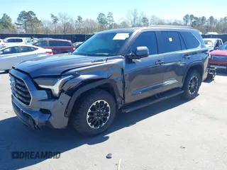 2024 Toyota Sequoia SR5 with VIN 7SVAAABA8RX047798, listed as a IAAI auction lot 41812410 with 7,411 mi miles. Bid and sale history available at carsss.com. Image 2.