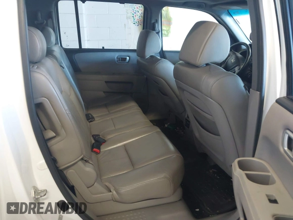 2010 Honda Pilot Touring with VIN 5FNYF4H95AB019903, listed as a IAAI auction lot 42196082 with 233,527 mi miles and . Bid and sale history available at carsss.com. Image 8.