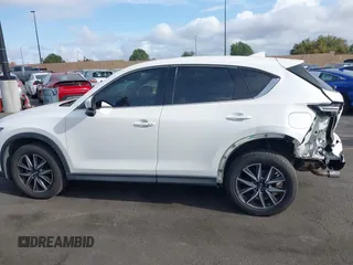 2018 Mazda CX-5 Grand Touring with VIN JM3KFADMXJ0470846, listed as a IAAI auction lot 41913533 with 54,700 mi miles and . Bid and sale history available at DreamBid. Image 15.