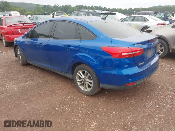 2018 Ford Focus SE with VIN 1FADP3F26JL212866, listed as a IAAI auction lot 42627026 with 211,072 mi miles and . Bid and sale history available at DreamBid. Image 3.